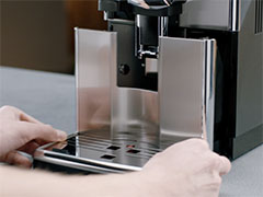 Повідомлення на екрані еспрессо кавомашини Philips Saeco "empty coffee grounds container" (спорожніть контейнер для меленої кави)