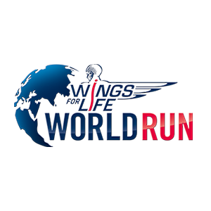 The man using Philips open-ear bone conduction headphones at gym