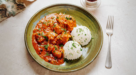 Тушеная свинина в винном соусе